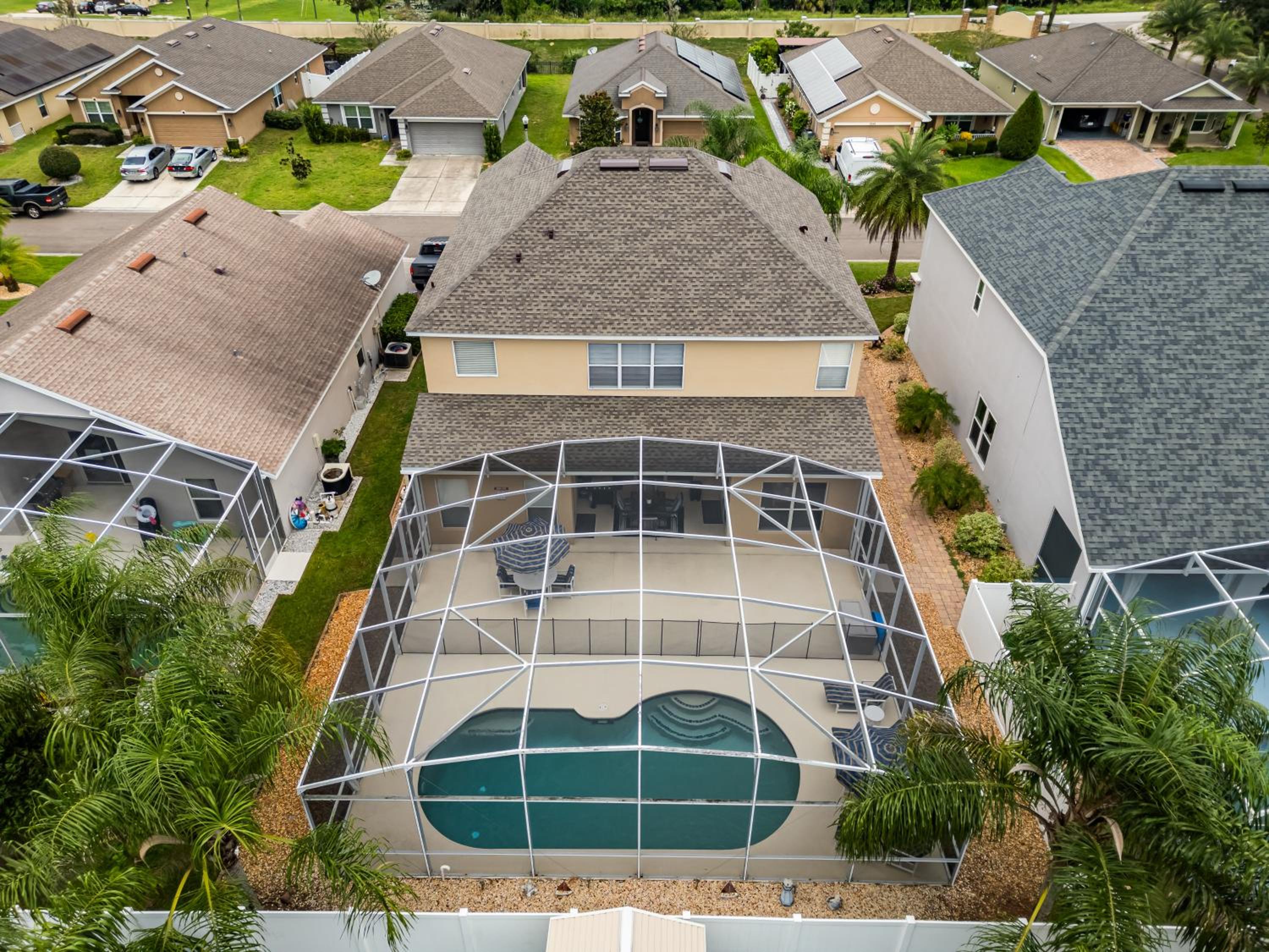 12 Min to Disney Heated Pool Family-Friendly BBQ Game Room & Sleeps 16 Guests