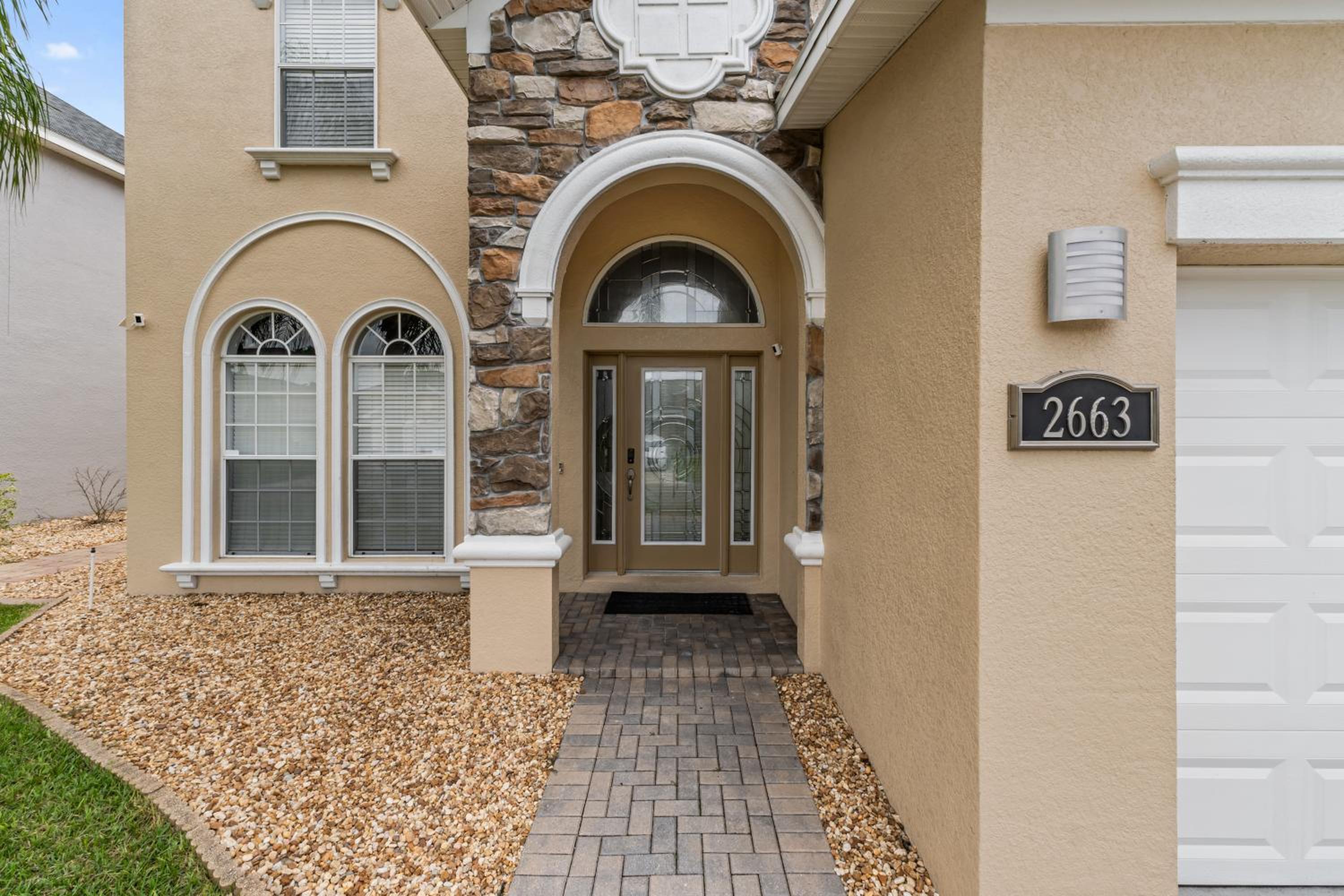 12 Min to Disney Heated Pool Family-Friendly BBQ Game Room & Sleeps 16 Guests