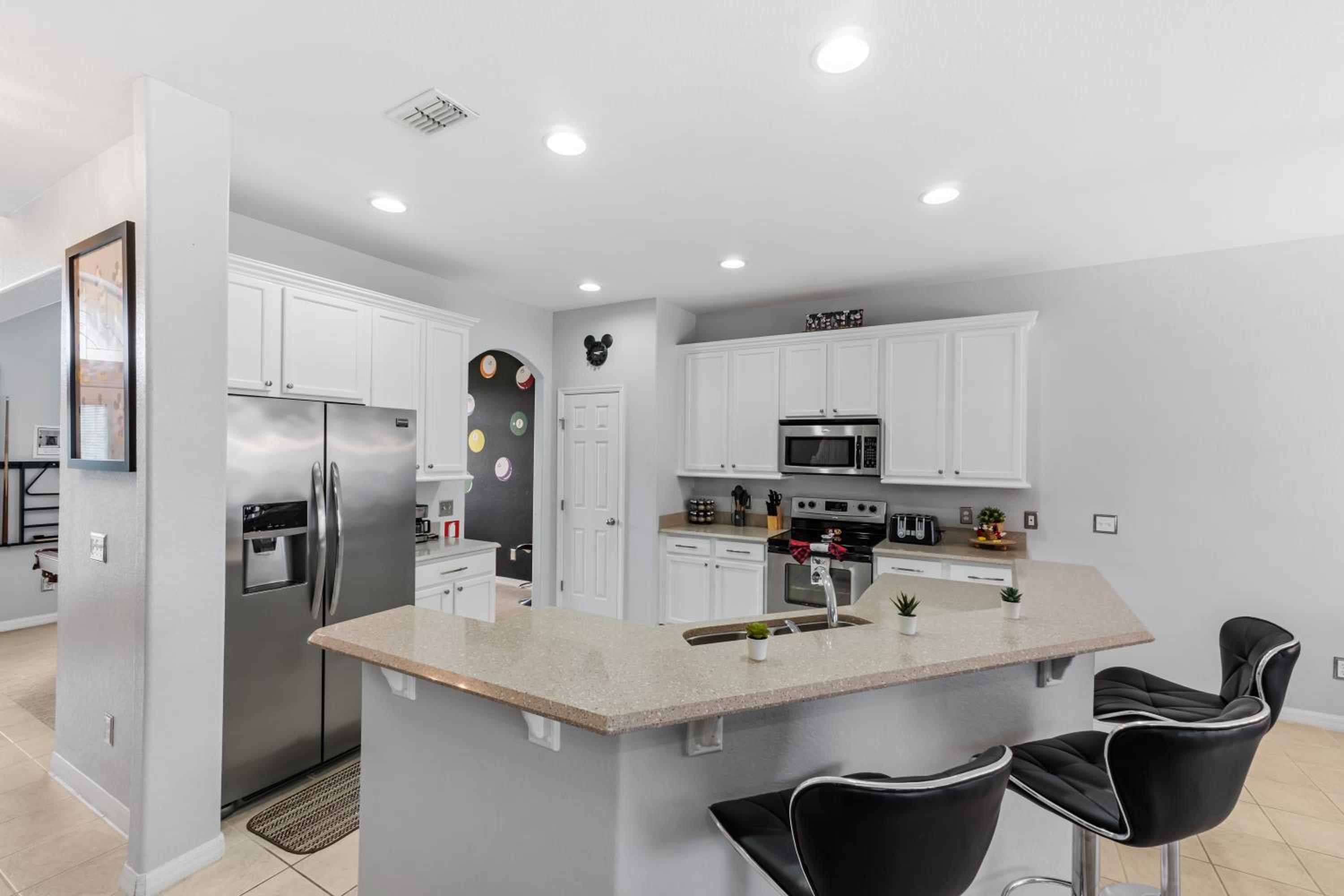 12 Min to Disney Heated Pool Family-Friendly BBQ Game Room & Sleeps 16 Guests