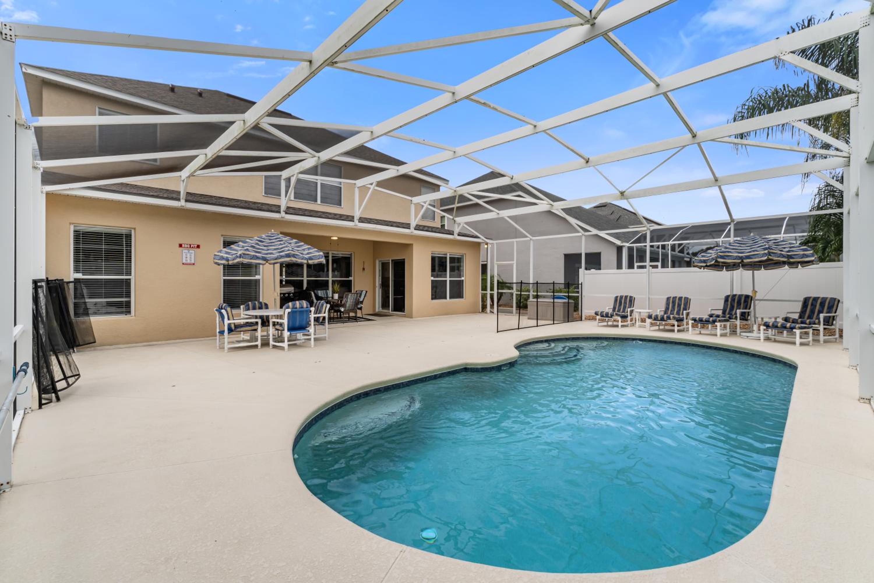 12 Min to Disney Heated Pool Family-Friendly BBQ Game Room & Sleeps 16 Guests