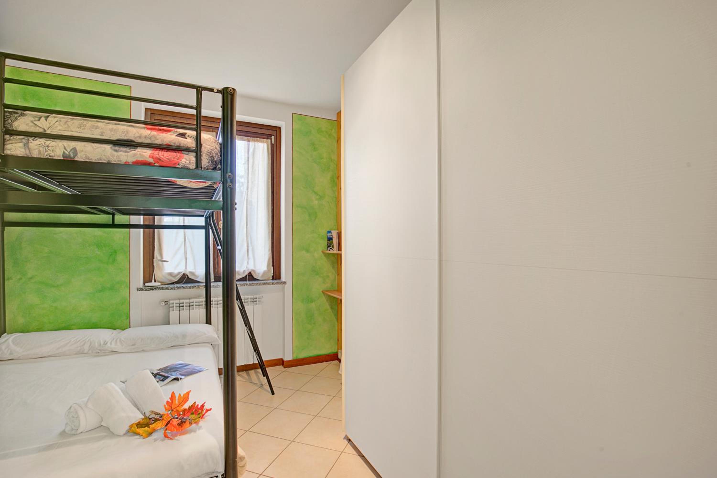 Holiday Sun Puegnago | Terrace & Pool - Happy Rentals view 5