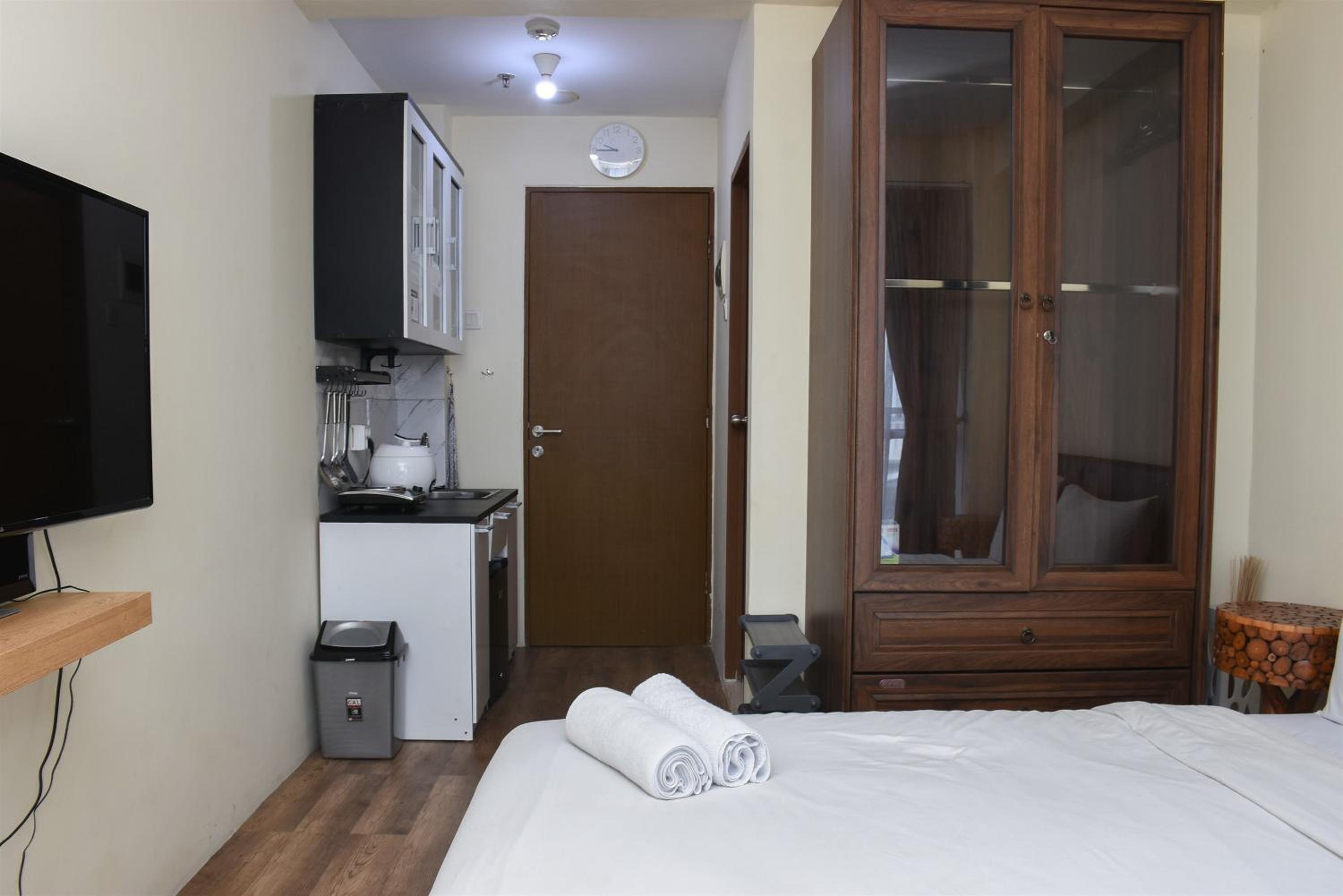 Nice and Cozy Studio at Tifolia Apartment By Travelio view 4