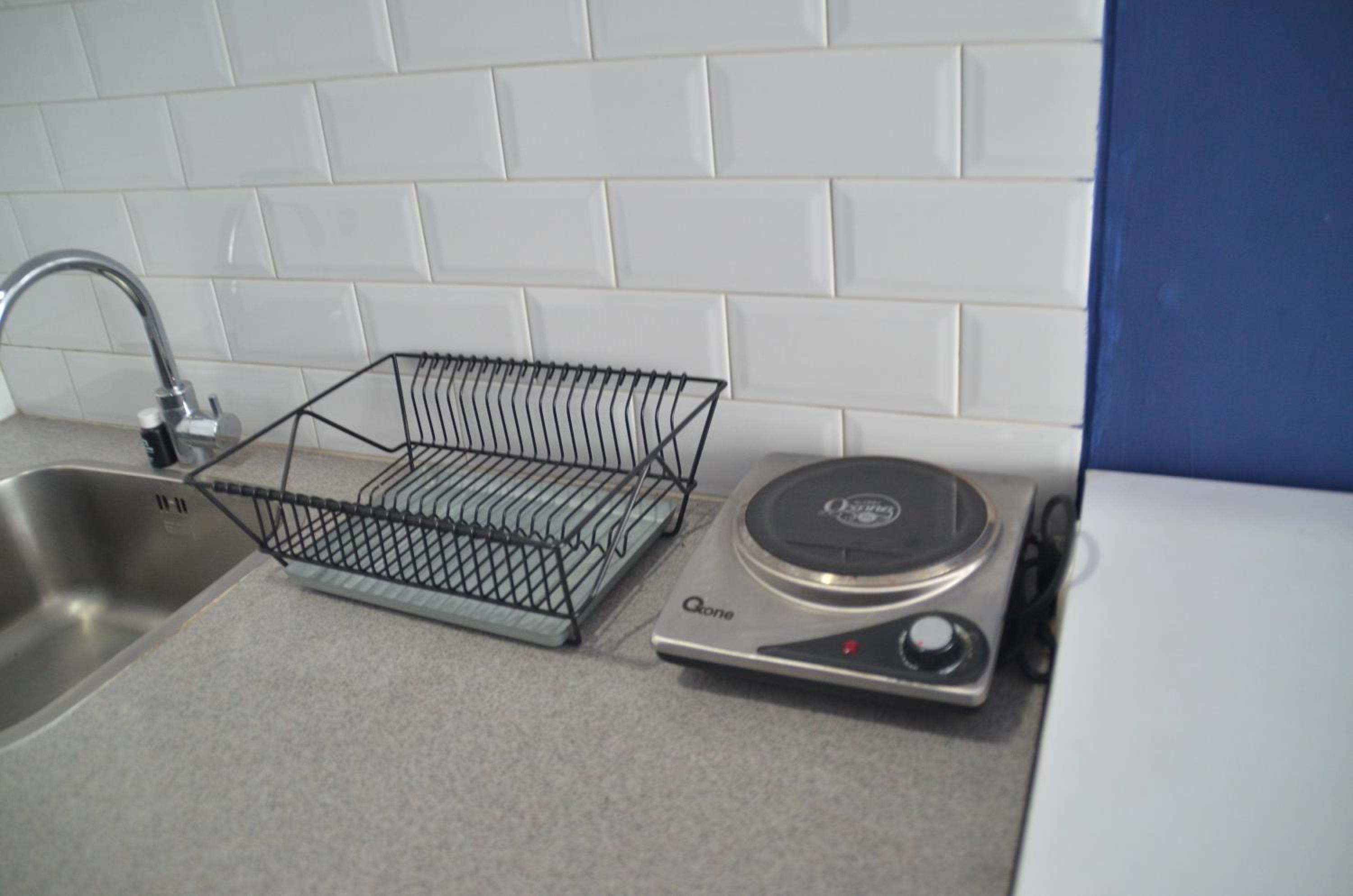 Nice and Cozy Studio at Paddington Heights Apartment By Travelio view 4