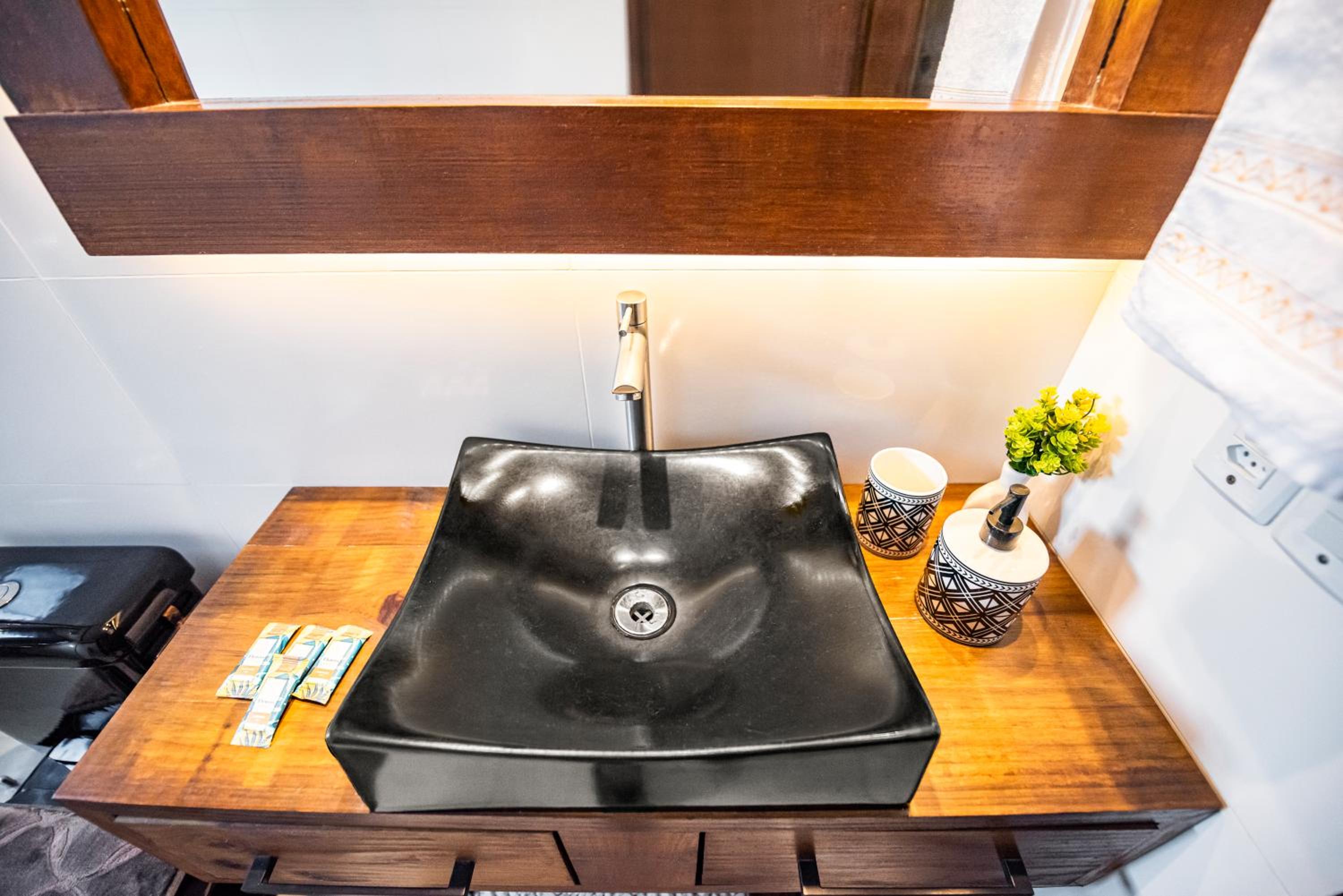 Cabana Aconchegante a 800m da Praia - Lareira externa, Quintal Amplo, Pet Friendly, Ar condicionado, Netflix e Conforto completo