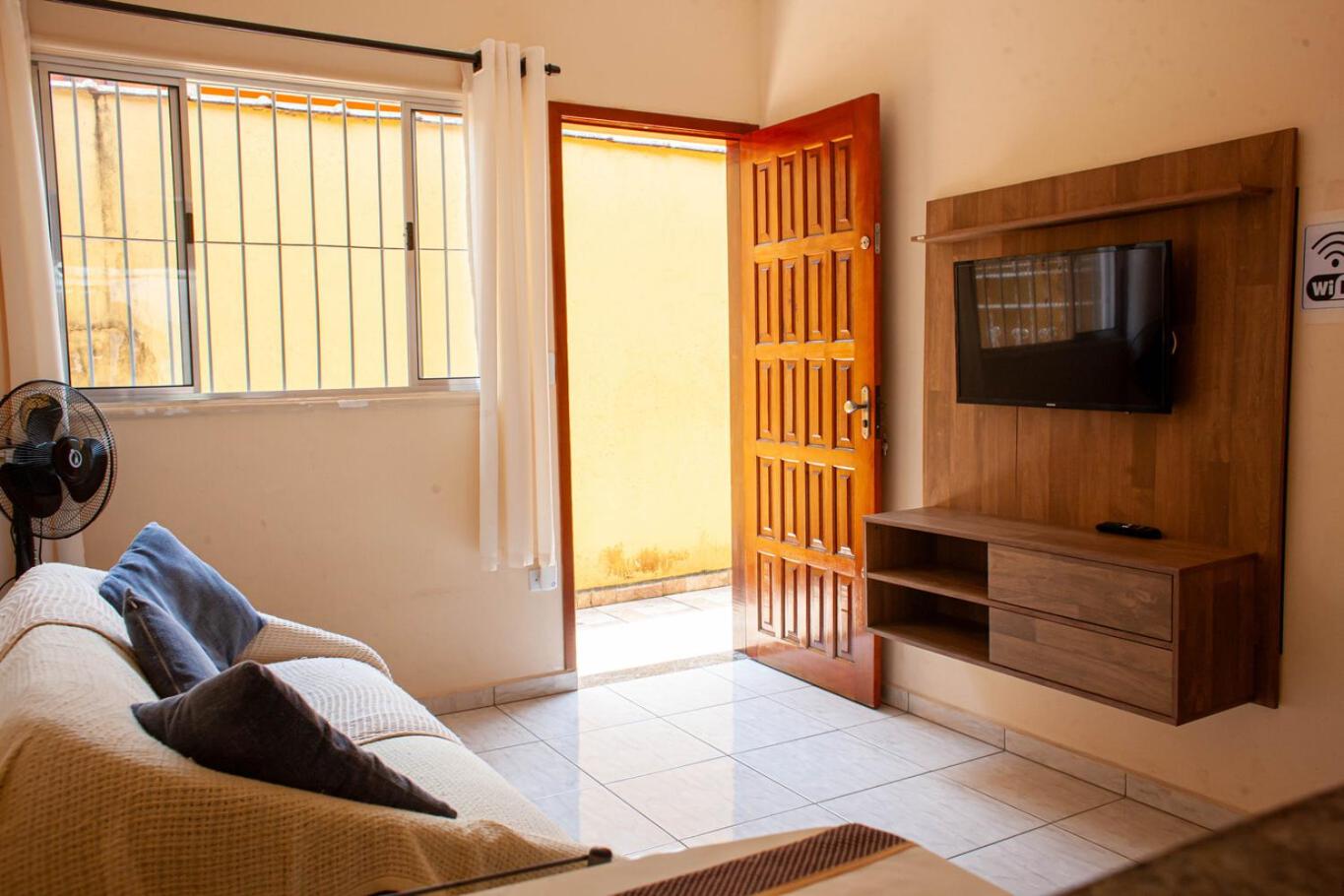 Casa aconchegante c churrasqueira a 400m da praia