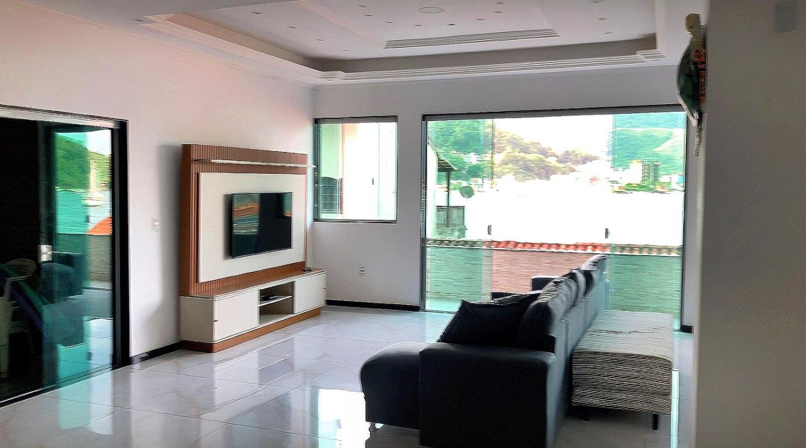 Casa na praia com vista para o mar