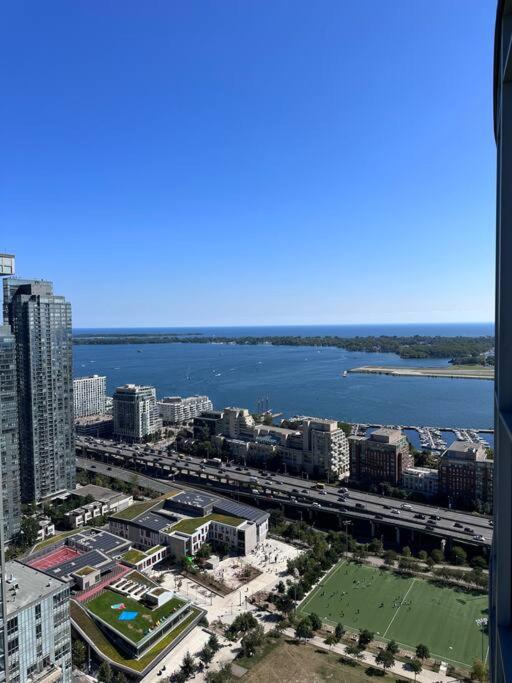 Sky Living Awesome Lake and City View