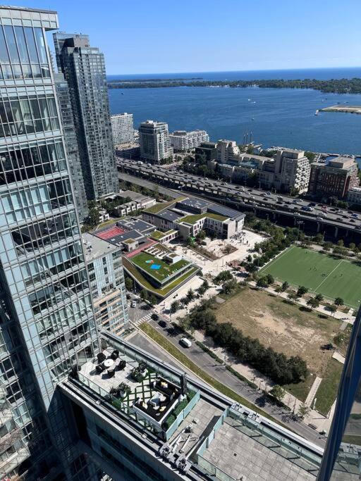 Sky Living Awesome Lake and City View