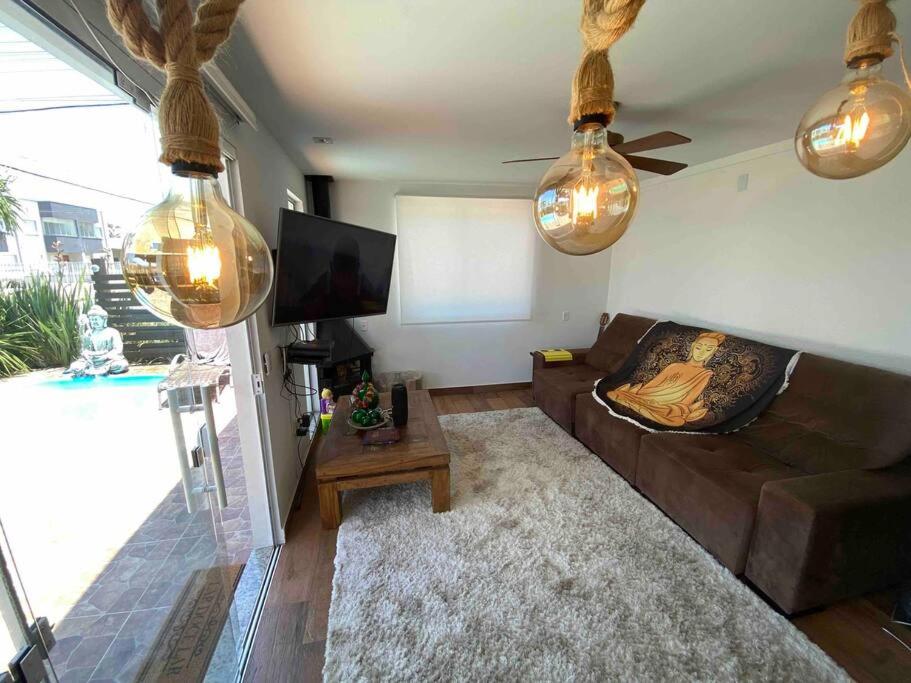 Casa Buda com piscina e espaço gourmet