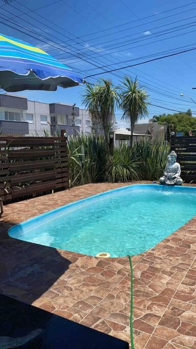 Casa Buda com piscina e espaço gourmet