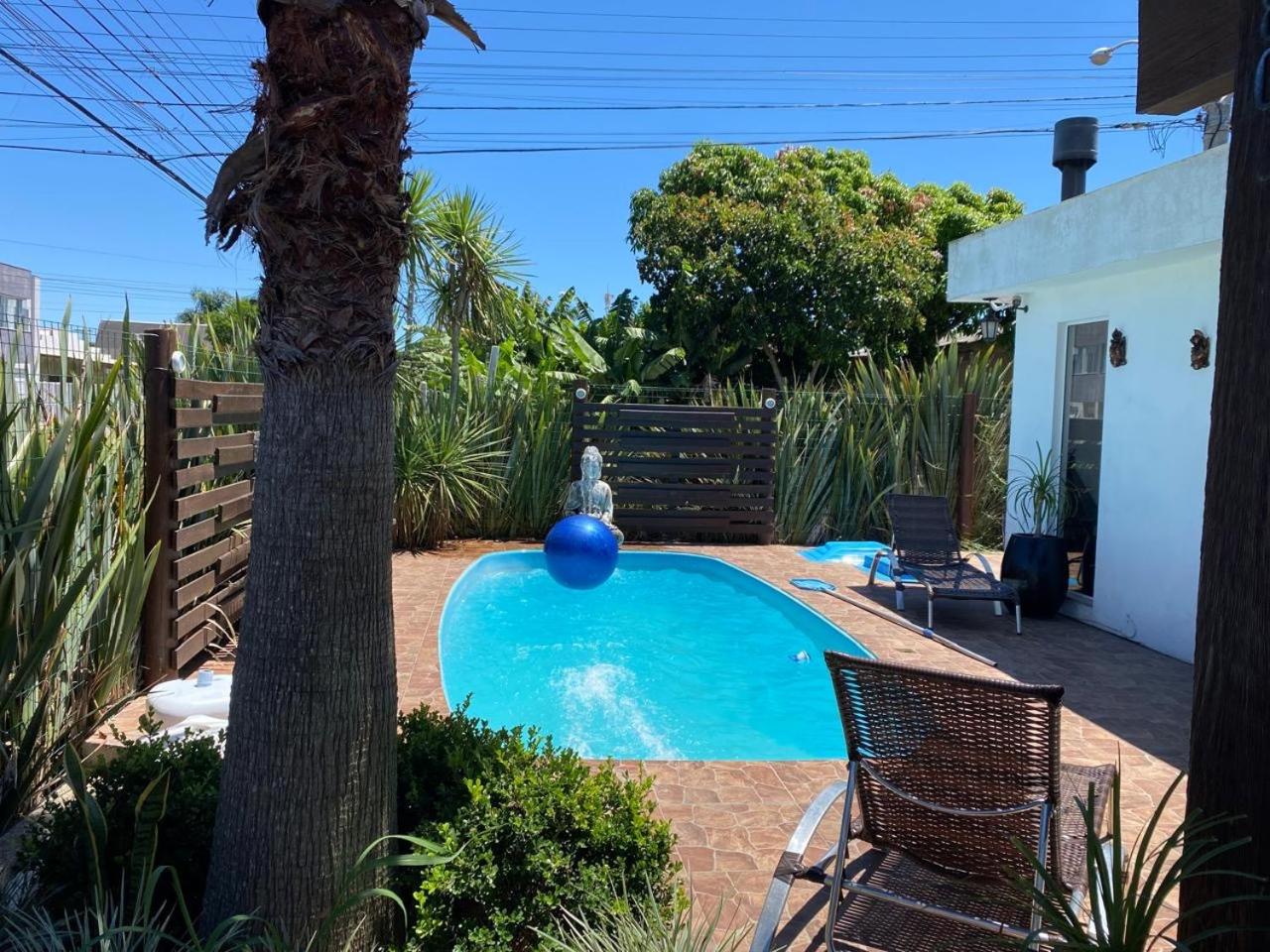 Casa Buda com piscina e espaço gourmet