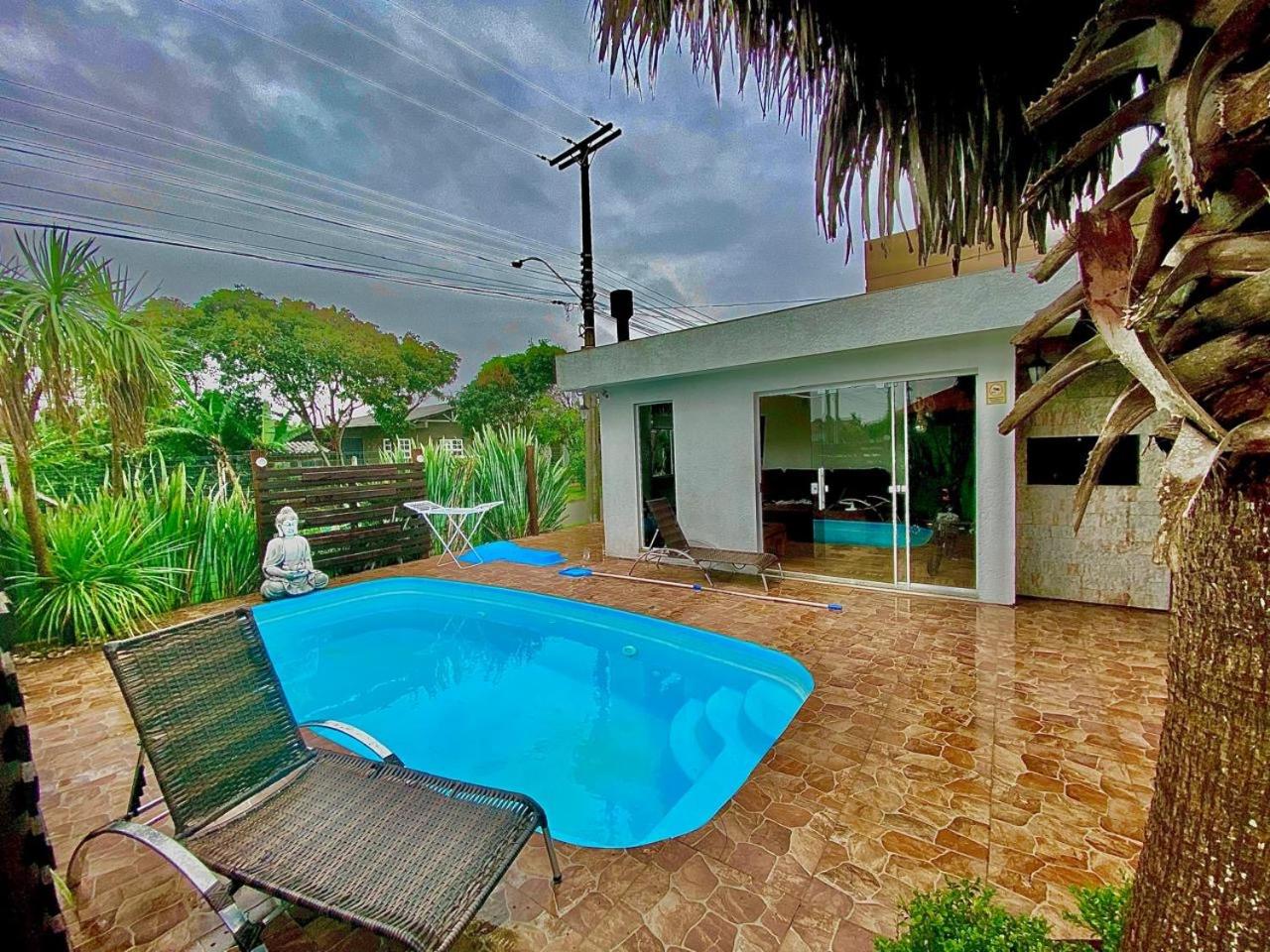 Casa Buda com piscina e espaço gourmet