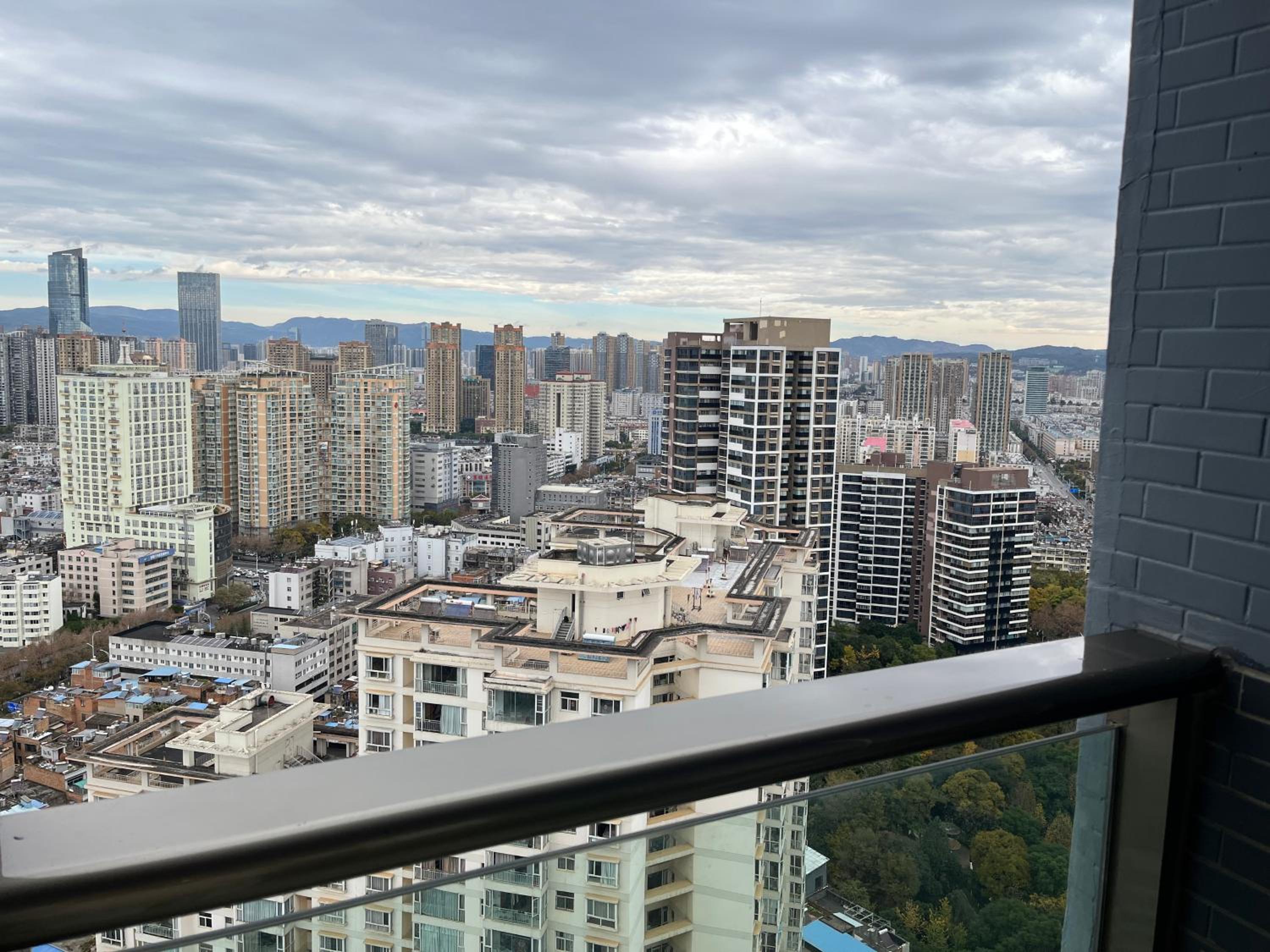 Kunming Qicaimen Shangpin Apartment