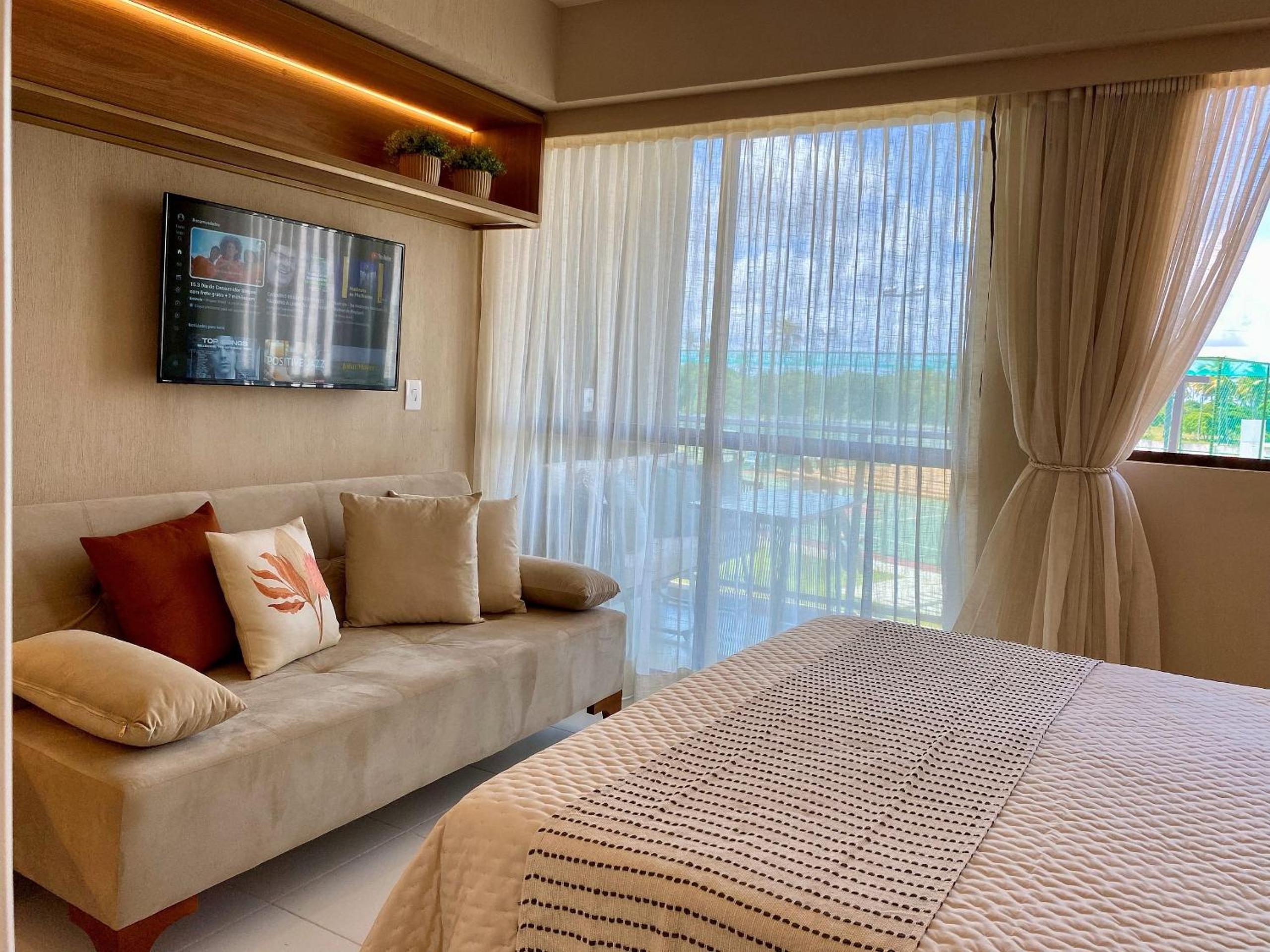 Flat Mana Beach Experience - Muro Alto