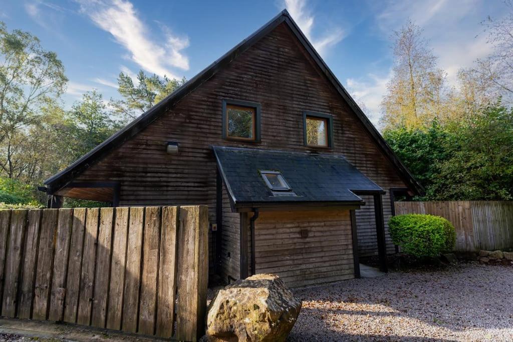 Norbury, woodland lodge with hot tub for 12