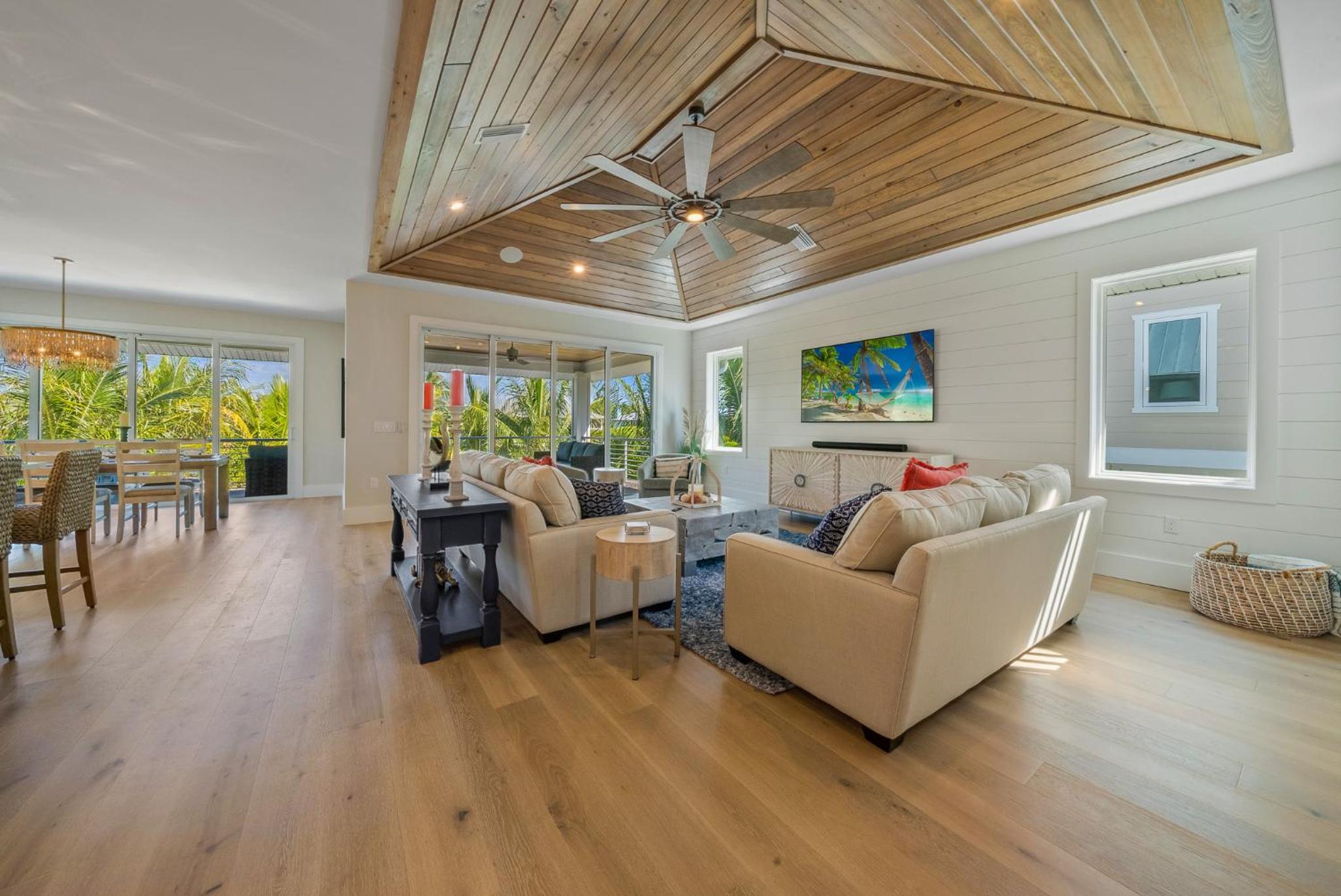 AcquaLuxe - Exquisite 2022 Lux Canal Home w Outdoor Oasis Pool Spa Dock SUP Kayaks Fire Pit view 3