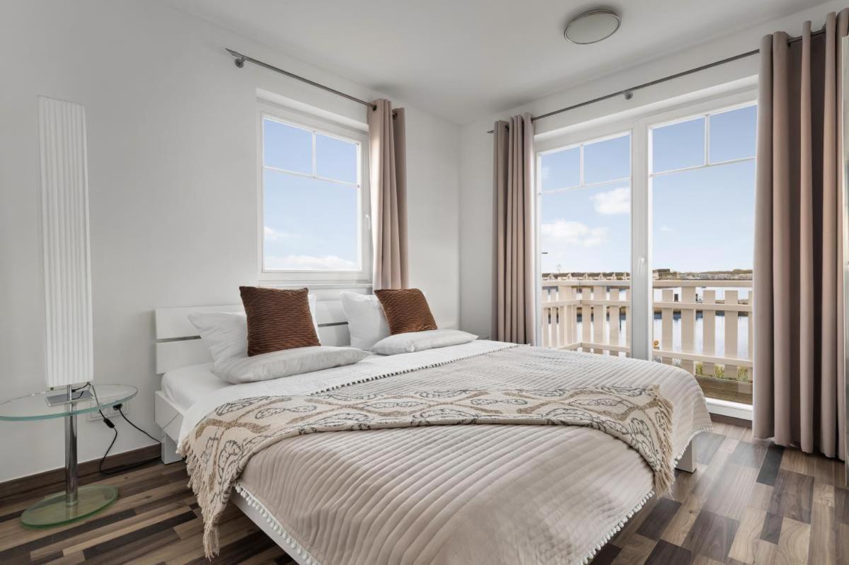 Haus am Strand - Ferienwohnung für 4 in Olpenitz mit Dachterrasse, Strandzugang und Ostseeblick