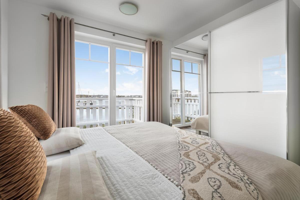Haus am Strand - Ferienwohnung für 4 in Olpenitz mit Dachterrasse, Strandzugang und Ostseeblick