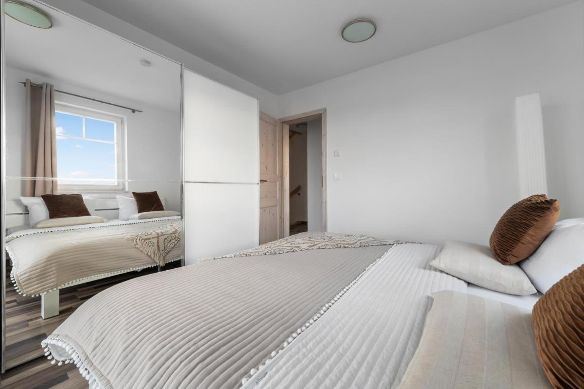Haus am Strand - Ferienwohnung für 4 in Olpenitz mit Dachterrasse, Strandzugang und Ostseeblick