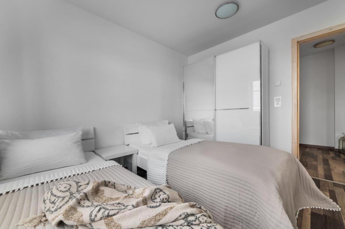 Haus am Strand - Ferienwohnung für 4 in Olpenitz mit Dachterrasse, Strandzugang und Ostseeblick