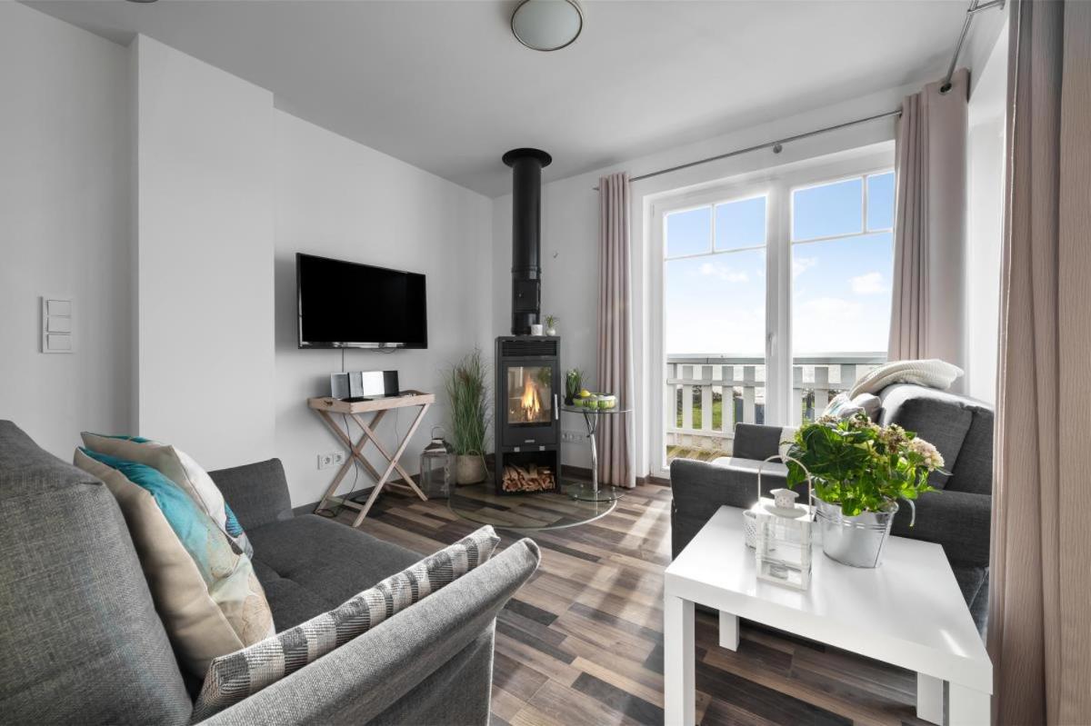 Haus am Strand - Ferienwohnung für 4 in Olpenitz mit Dachterrasse, Strandzugang und Ostseeblick