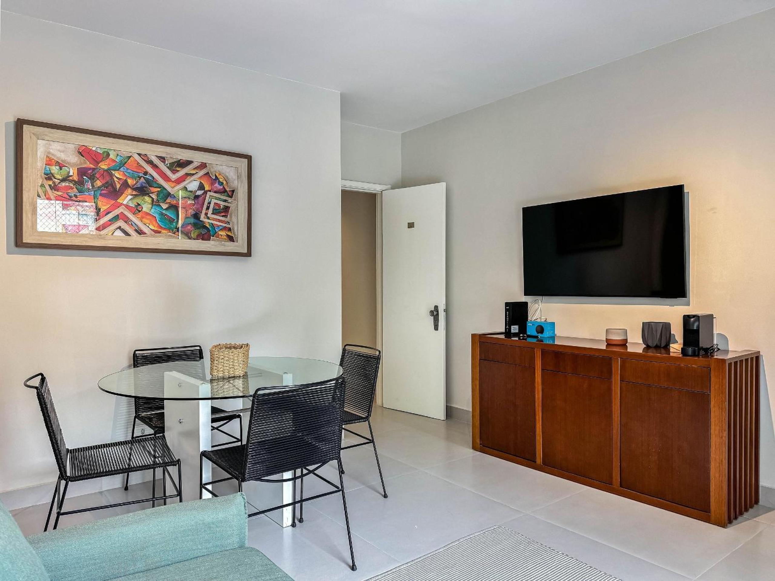 Flat com serviços e vista mar