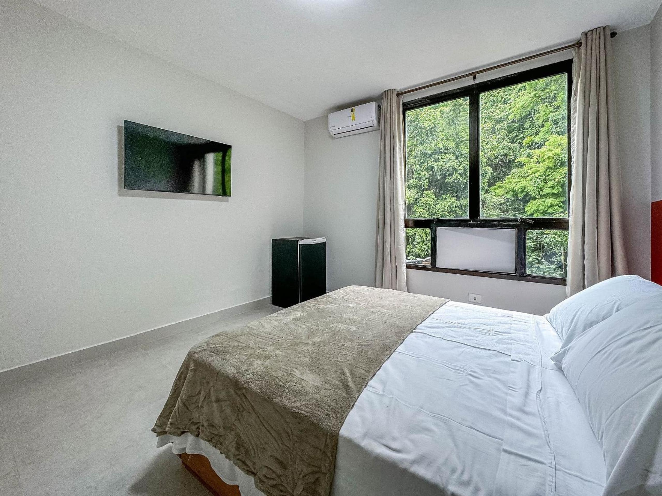 Flat com serviços e vista mar