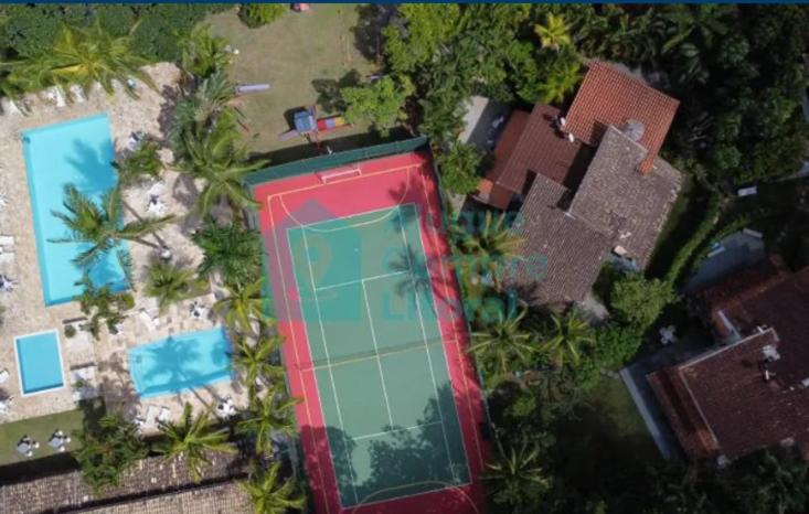 Casa em condomínio de frente ao mar