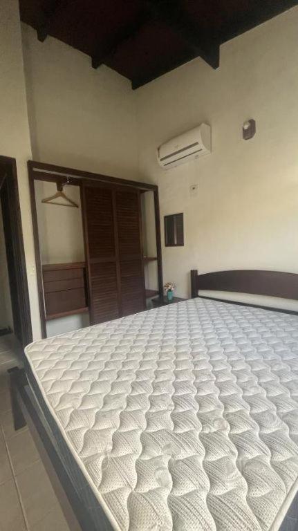 Casa em condomínio de frente ao mar