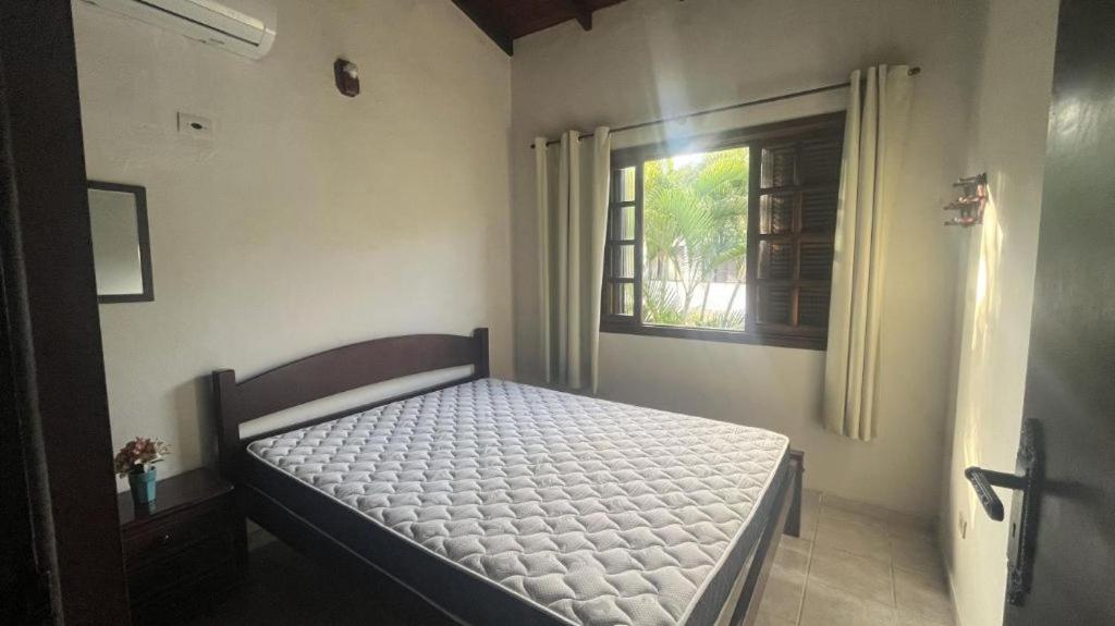 Casa em condomínio de frente ao mar
