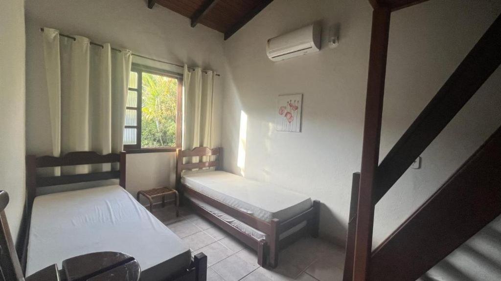 Casa em condomínio de frente ao mar