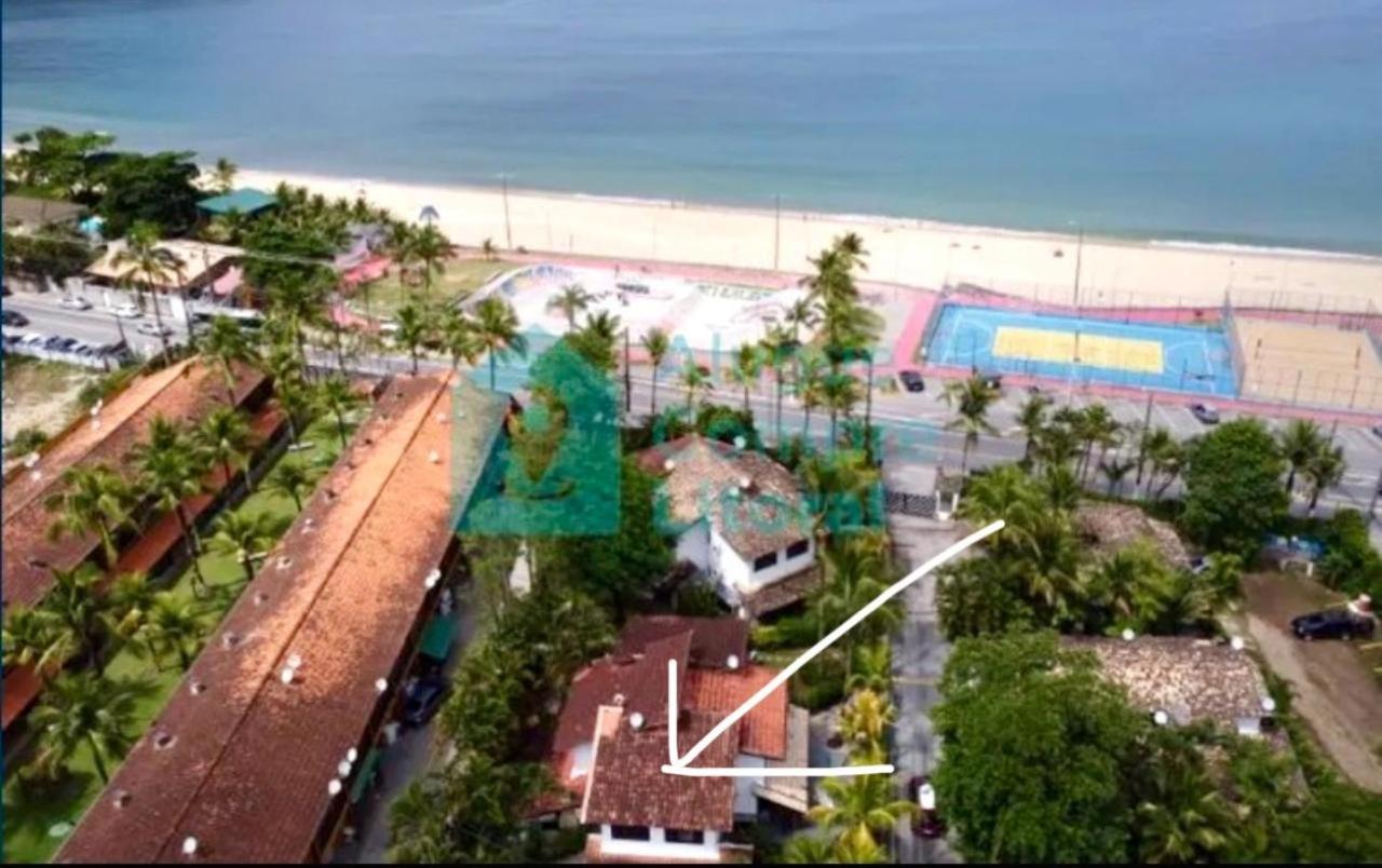 Casa em condomínio de frente ao mar