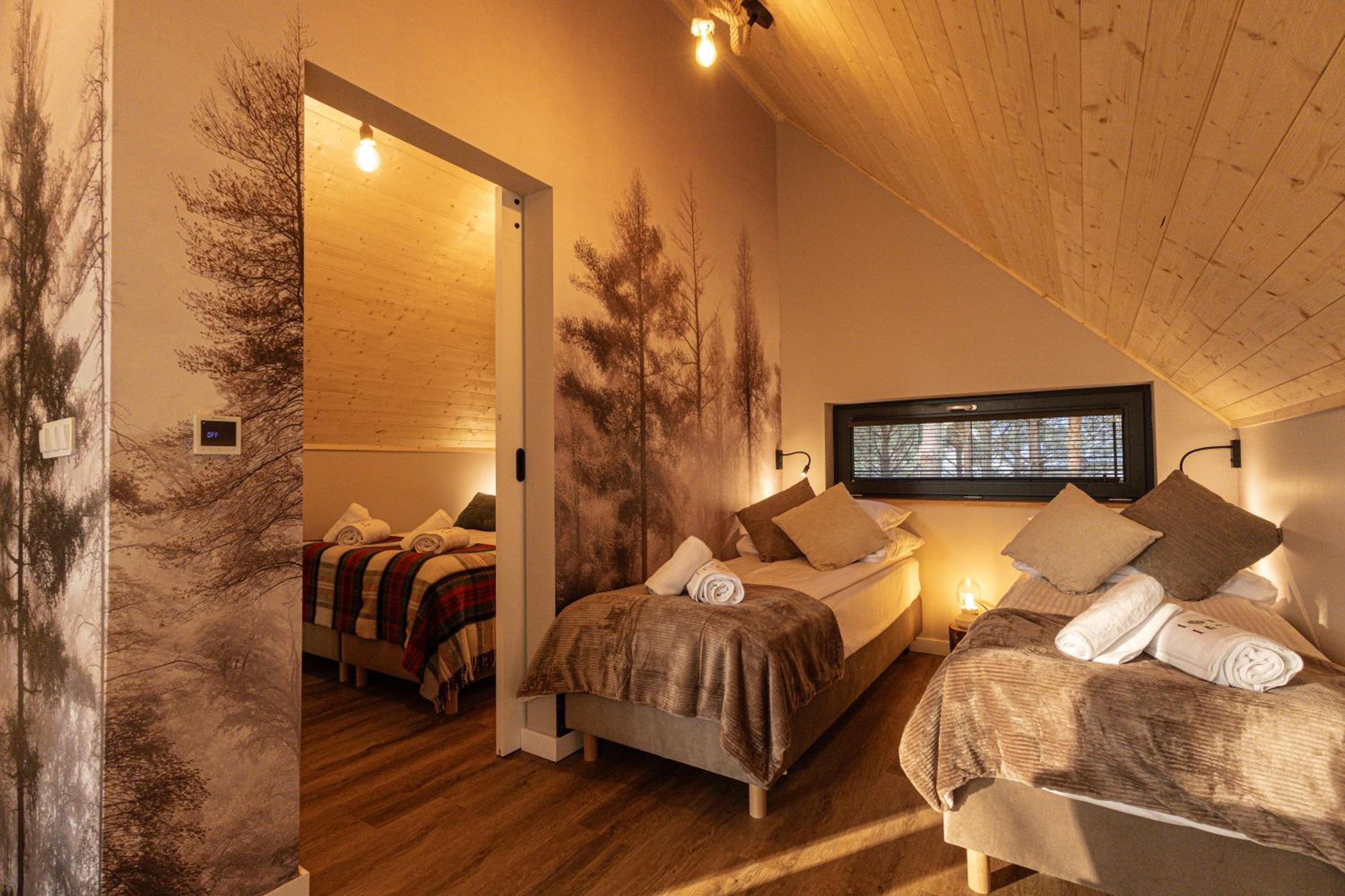 Osada LoveLaski - balia jacuzzi, sauna i kominek - całoroczne domki premium