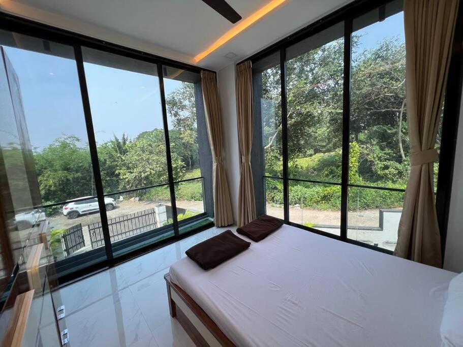 Stayhaven Starmount 4BHK & pool view 3