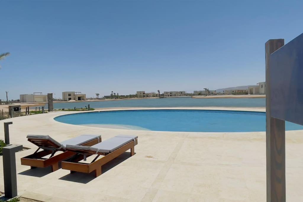 Ollystays Lagoon & Pool Views, Shedwan 1BR, Near Abu Tig ! view 3