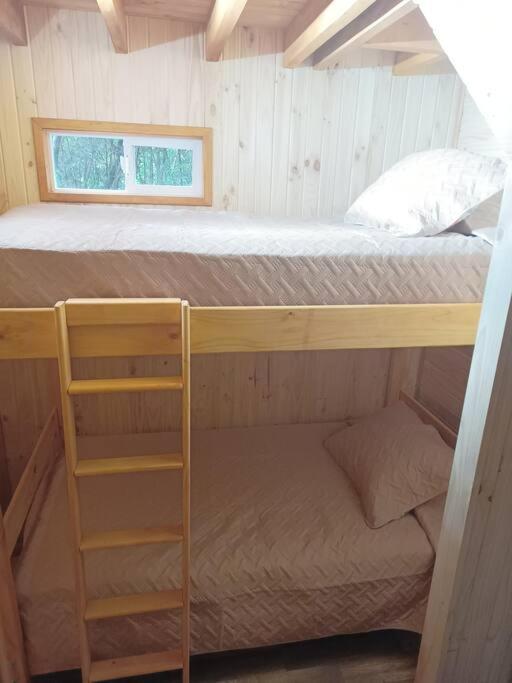 Cabaña en el bosque con opción tina caliente