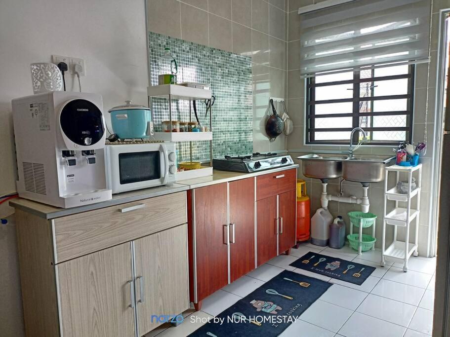 Nur Homestay bersih dan tenang photo 3