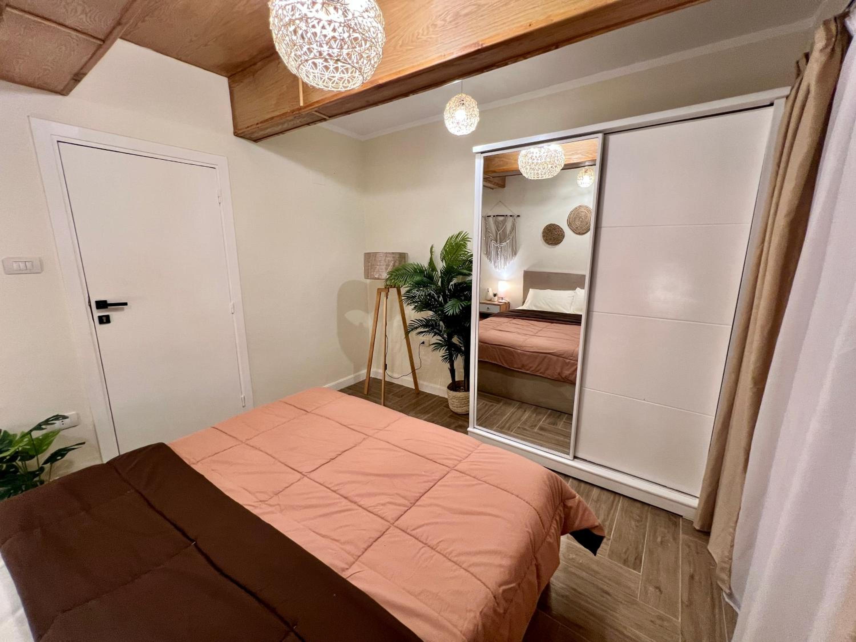 Boho 2BR Apartment with Garden View