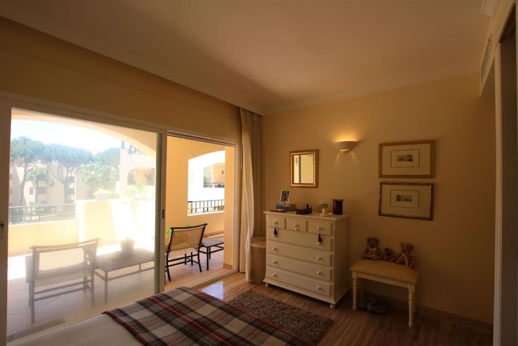Cosy beach side apartment overlooking the pool