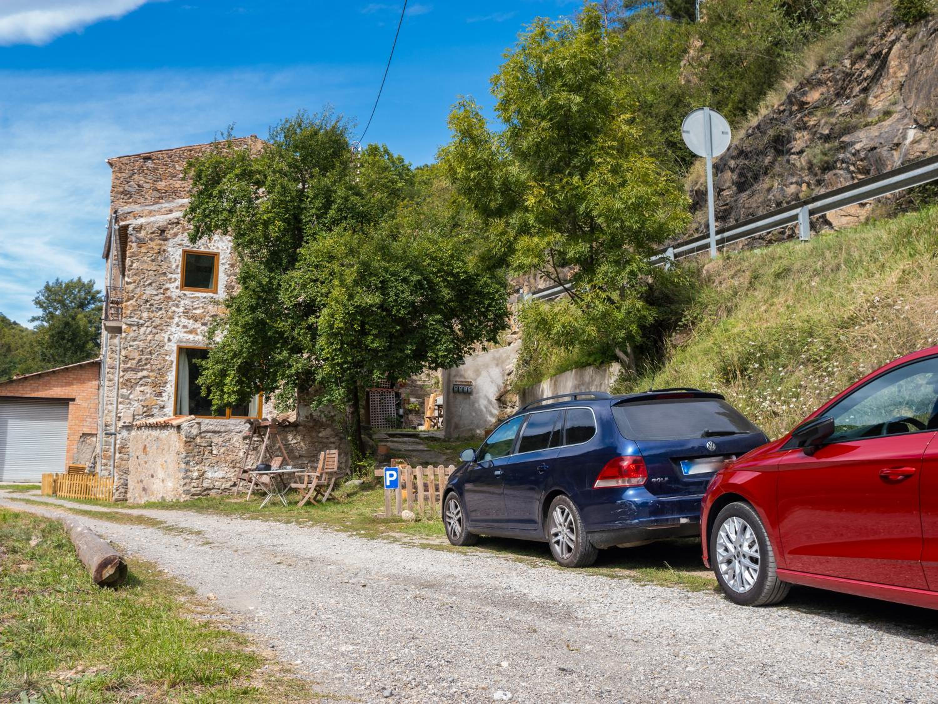 Apartament rústic en una masia al costat del riu