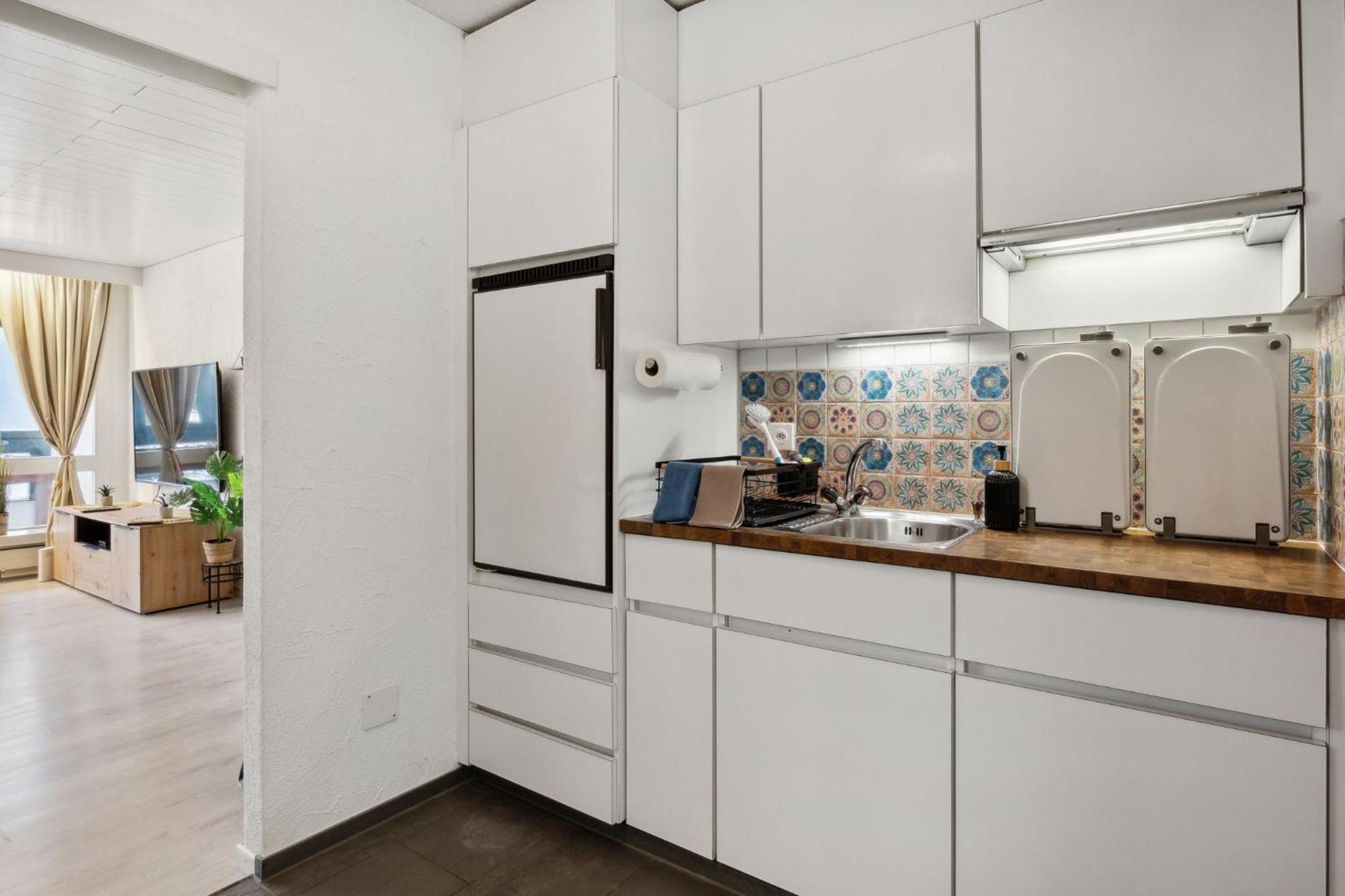 ReMo I 4 Seasons Apartment I 1-4 Personen I See, Bergsicht I 65'' Smart TV, Tischkicker und Badewanne I Parkplatz