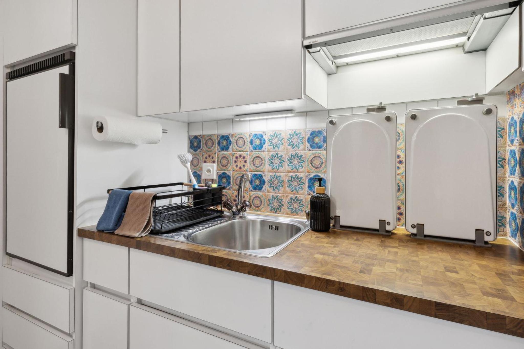 ReMo I 4 Seasons Apartment I 1-4 Personen I See, Bergsicht I 65'' Smart TV, Tischkicker und Badewanne I Parkplatz