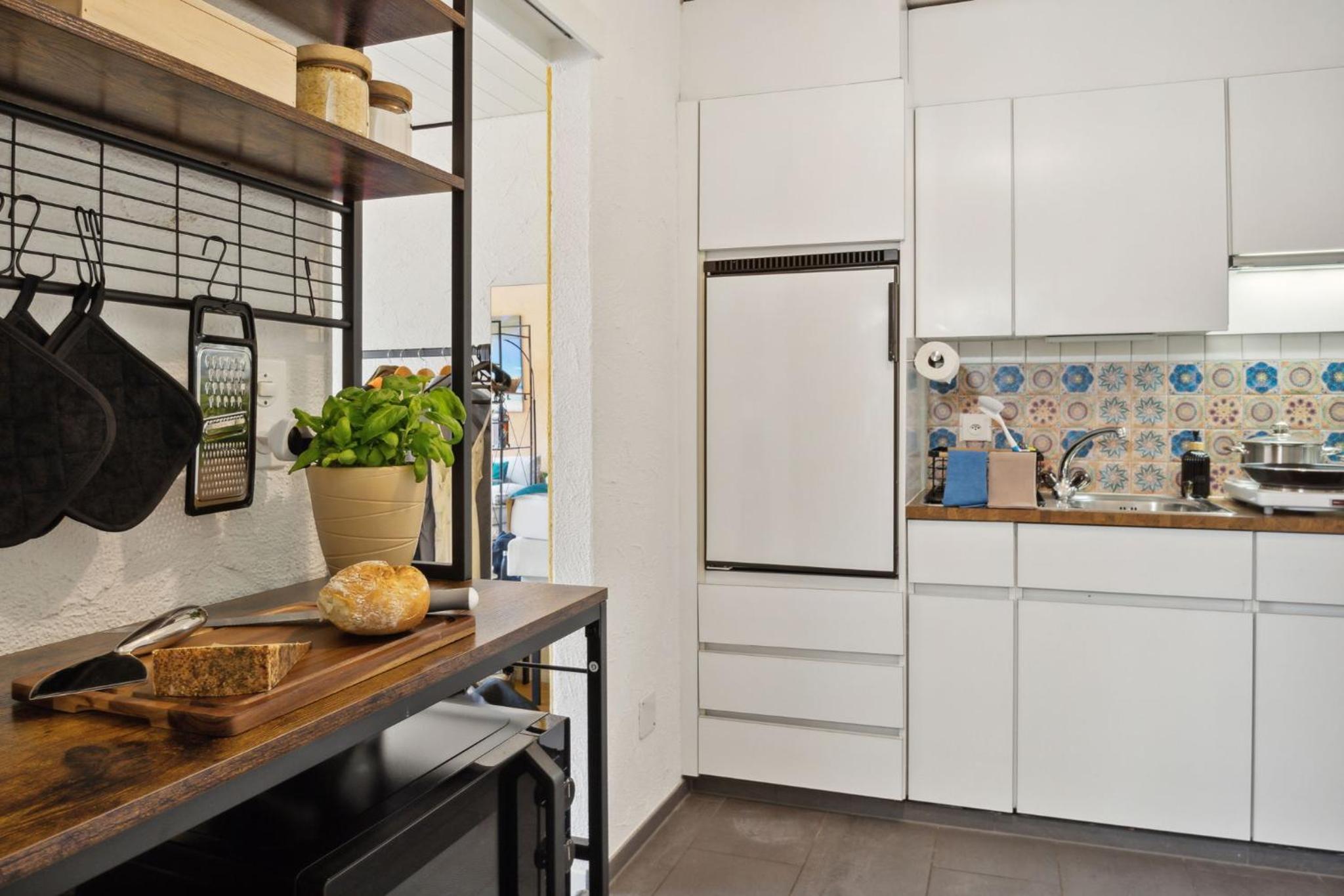 ReMo I 4 Seasons Apartment I 1-4 Personen I See, Bergsicht I 65'' Smart TV, Tischkicker und Badewanne I Parkplatz