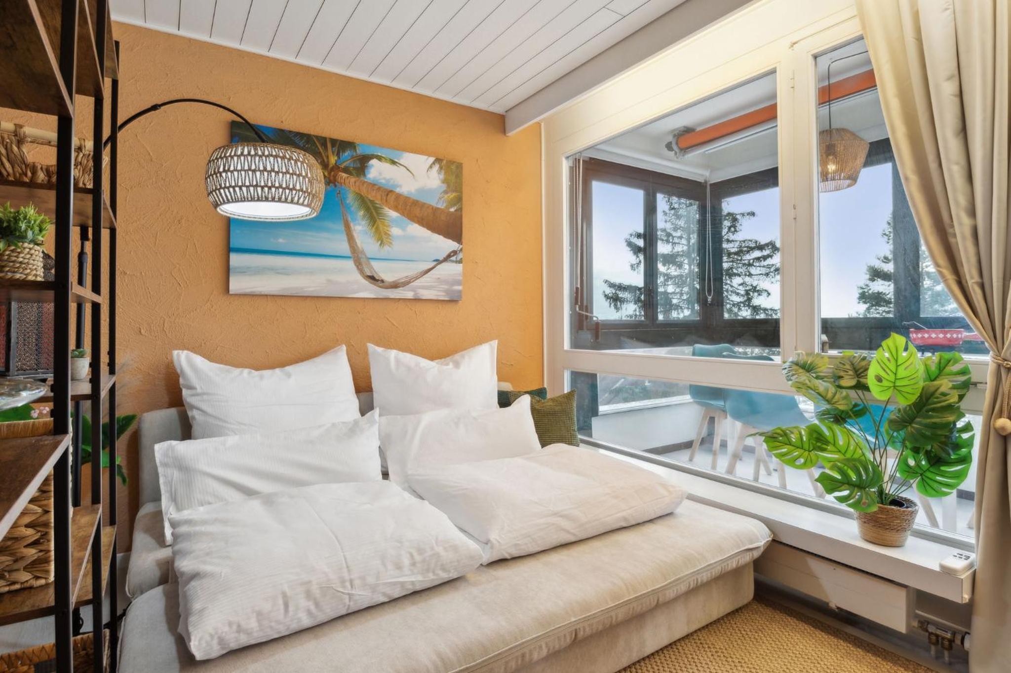 ReMo I 4 Seasons Apartment I 1-4 Personen I See, Bergsicht I 65'' Smart TV, Tischkicker und Badewanne I Parkplatz
