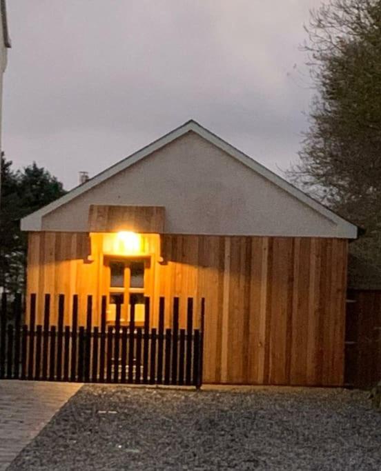 Cosy Studio Cabin set in nature with stove view 2