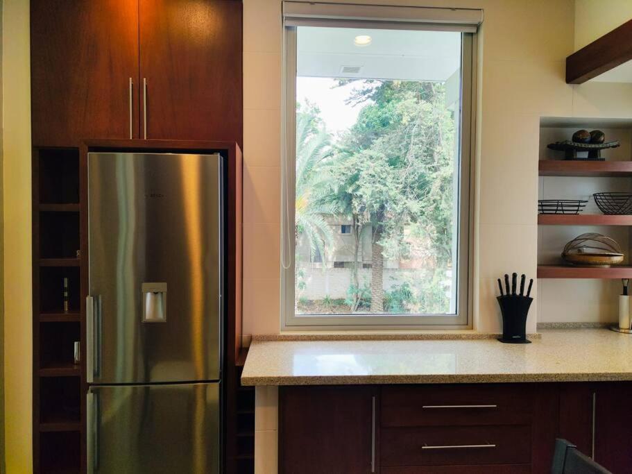 Casa Exclusiva Roble y Cristal