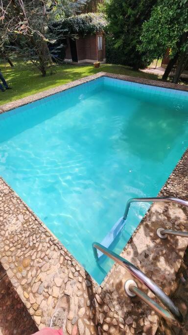 Casa Exclusiva Roble y Cristal