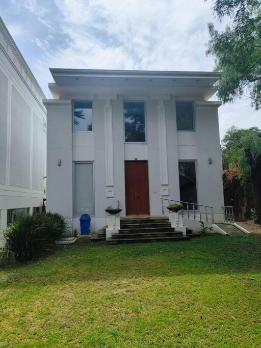 Casa Exclusiva Roble y Cristal