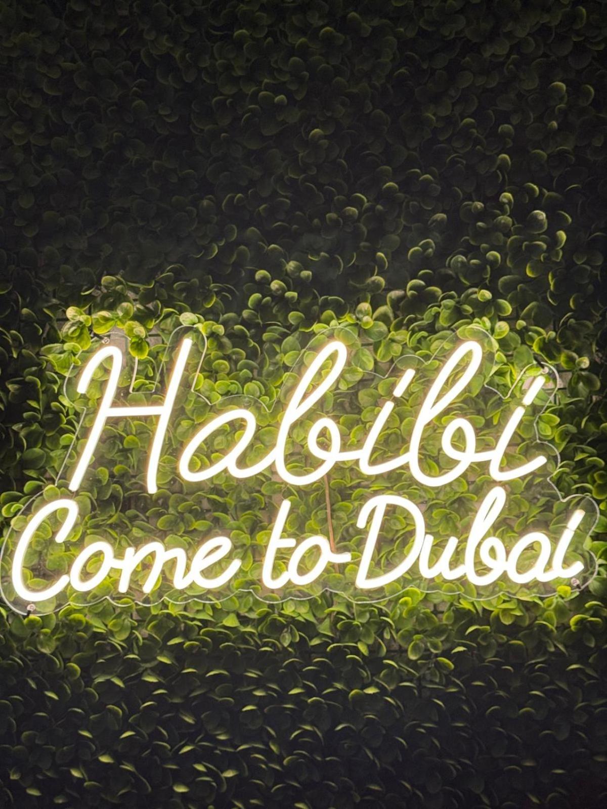 Luxury Two Bedroom Apartment with Balcony, Full Burj Khalifa & Fountain Views by Delujo Stays
