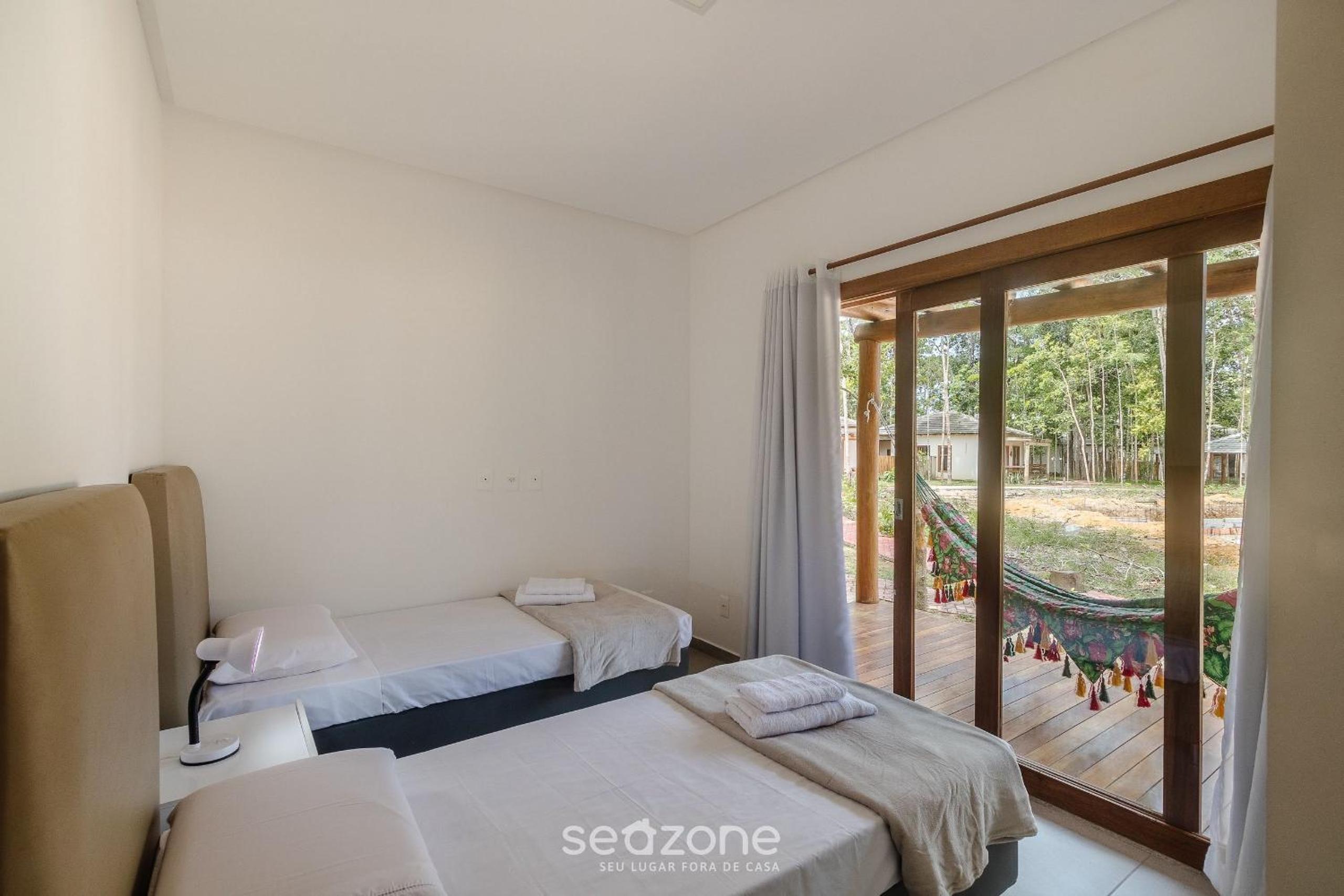 Casas No Condomínio EcoVillage d'Ajuda - EVL